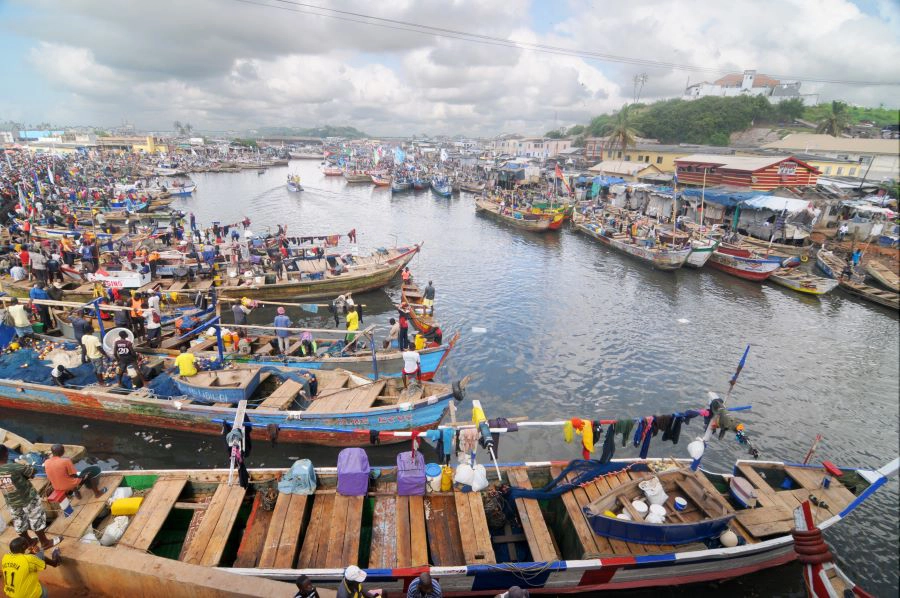 several small fishing boats on water